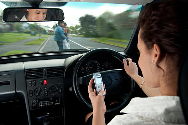 Transport driver denies texting, but charges follow