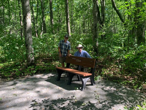 Donated benches installation begins at a park on Manitoulin Island