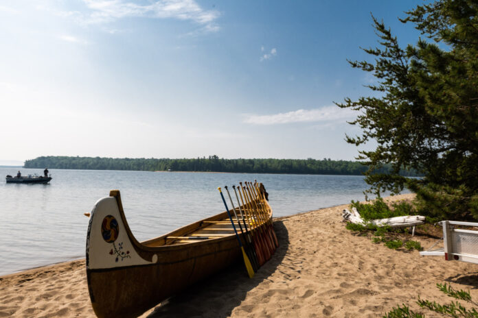 canoe and island - andrea moreau